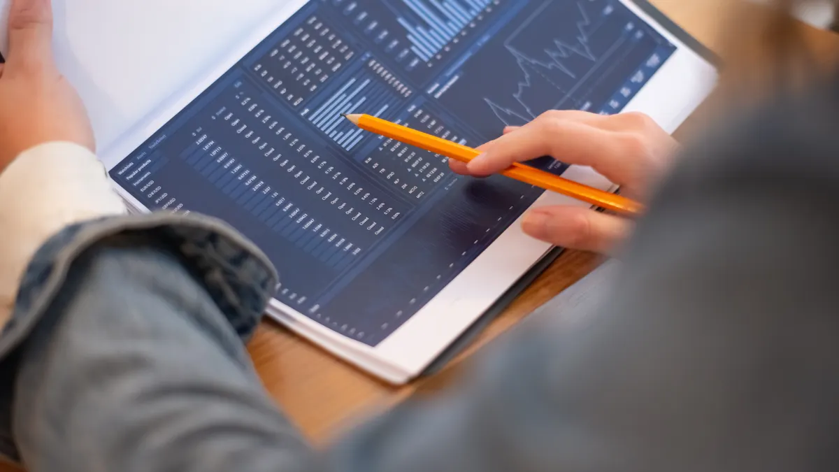 tablet with charts and data tables